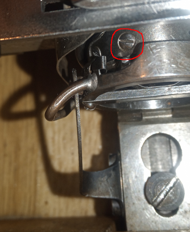 Adjust the tension on the lower thread with the bobbin case screw